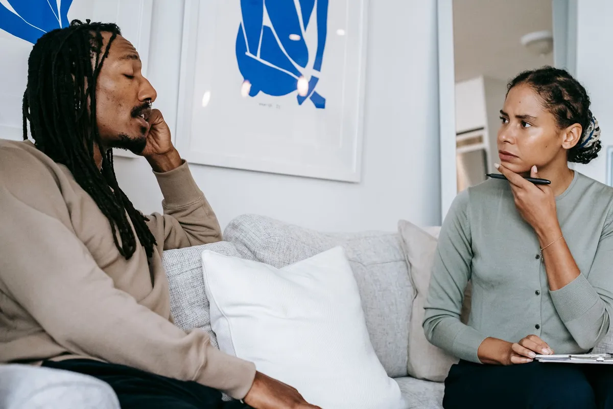 A man in an individual therapy session, part of cheating husband therapy that actually works